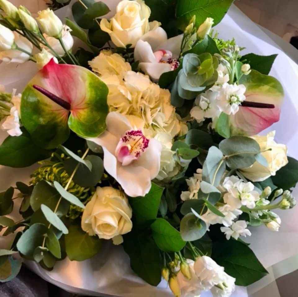 Amelia luxury bouquet — white and lime bouquet with Zafira anthuriums, Avalanche roses, cymbidium orchids and white hydrangea