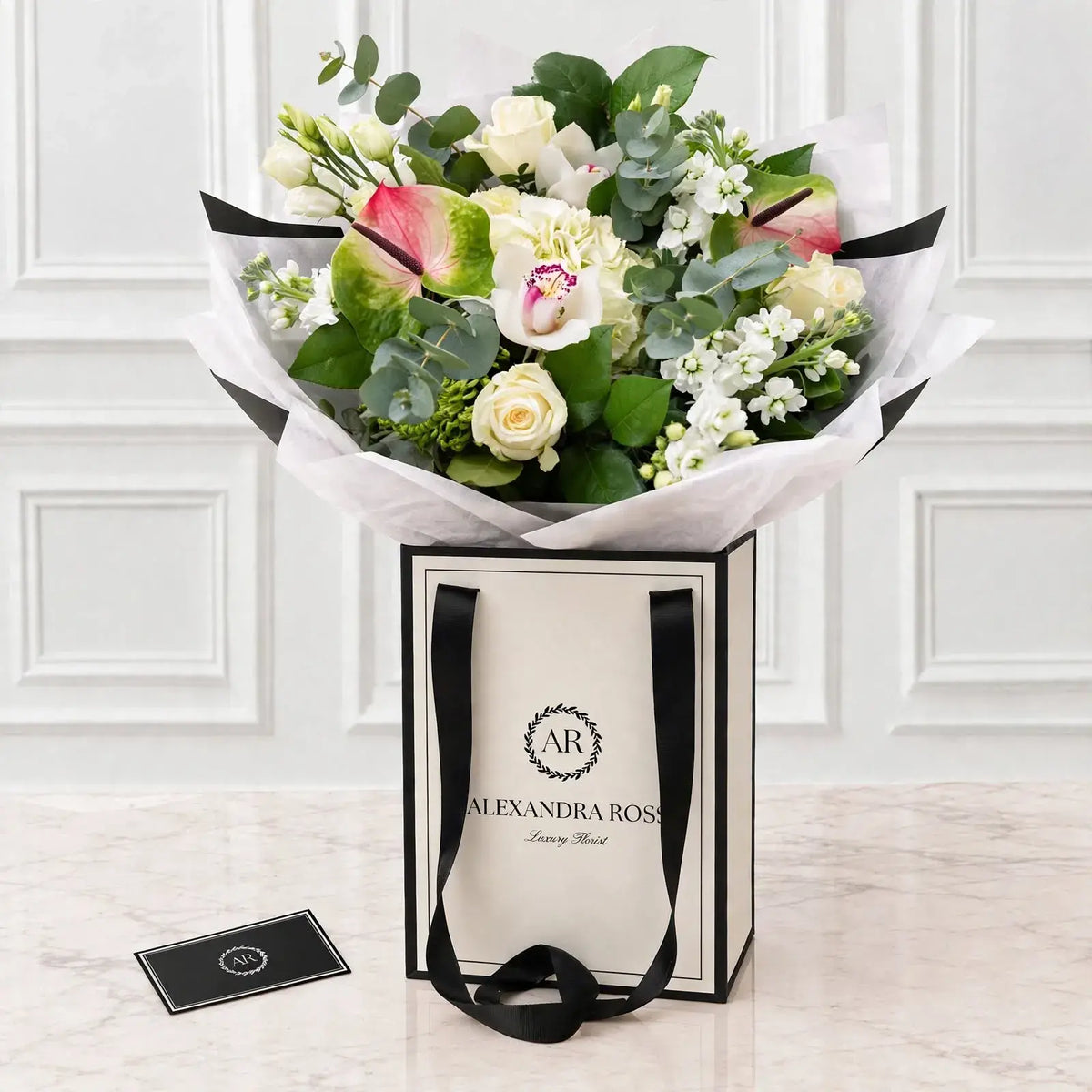 Amelia luxury bouquet — white and lime bouquet with Zafira anthuriums, Avalanche roses, cymbidium orchids and white hydrangea