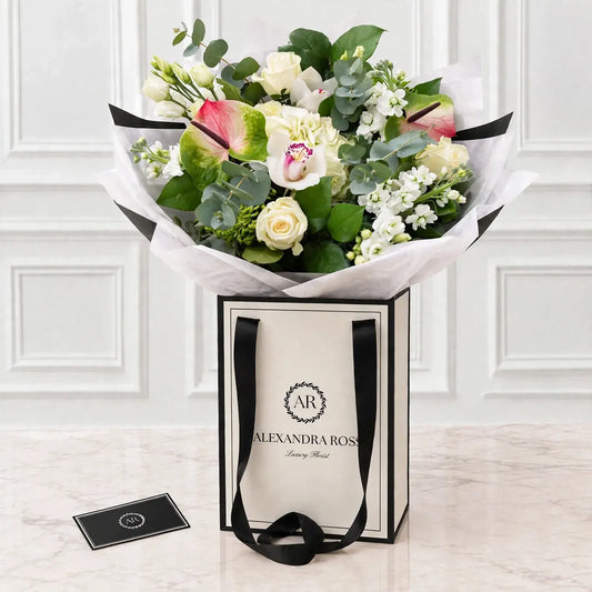 Amelia luxury bouquet — white and lime bouquet with Zafira anthuriums, Avalanche roses, cymbidium orchids and white hydrangea