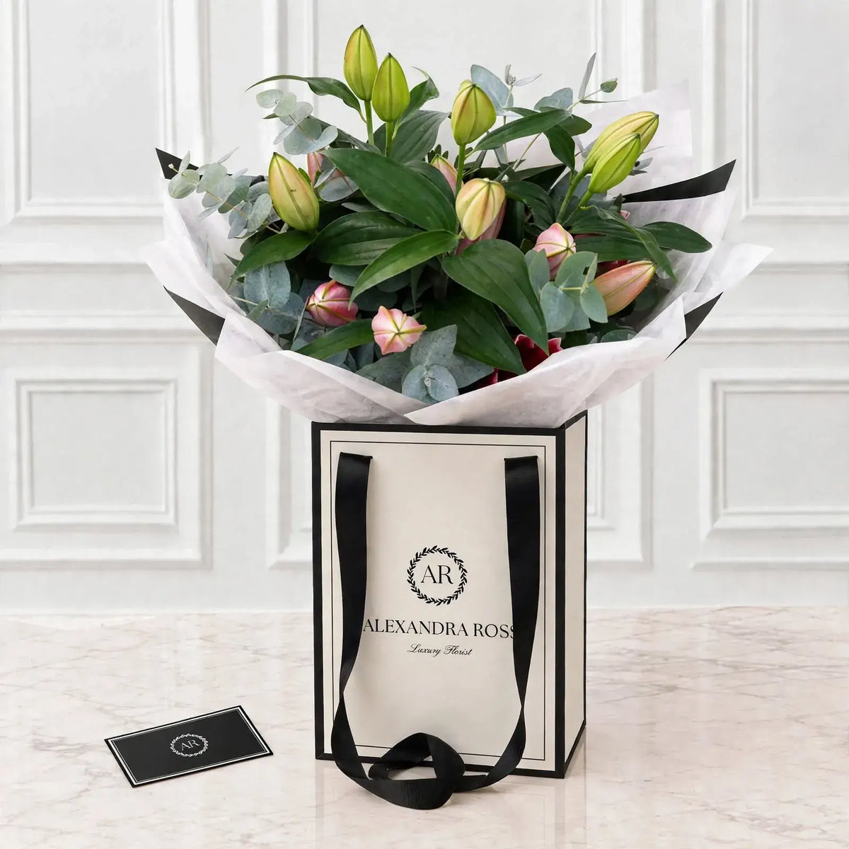 Bella pink Oriental lily hand-tied bouquet with foliage