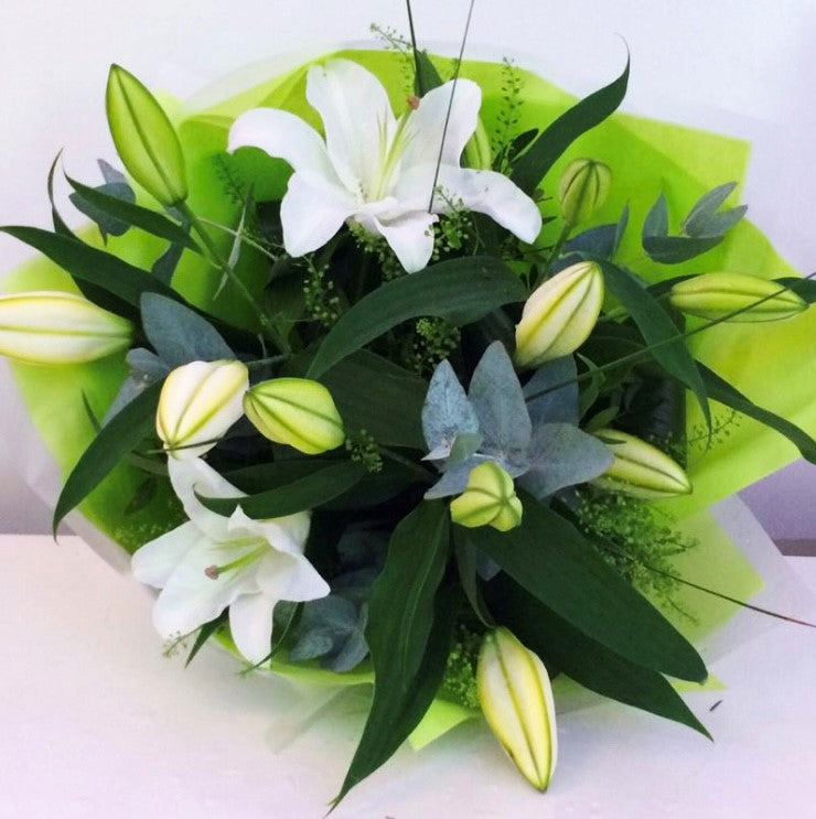 Beloved white Oriental lily hand-tied bouquet with foliage
