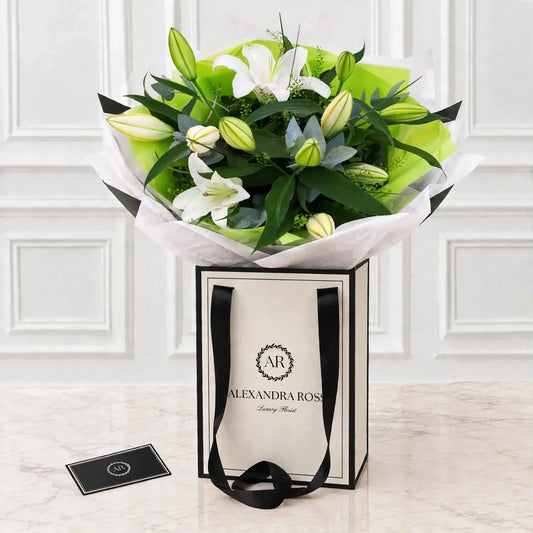 Beloved white Oriental lily hand-tied bouquet with foliage