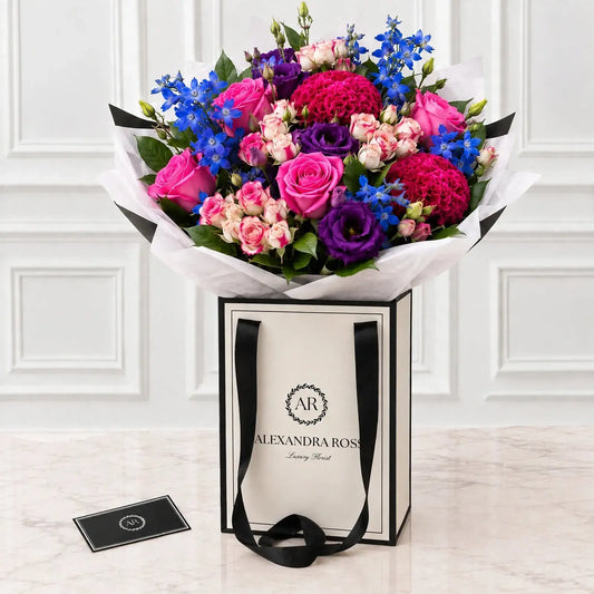 Chrissy luxury bouquet — country chic style with electric blue delphinium, pink celosia, purple lisianthus and pink aqua roses