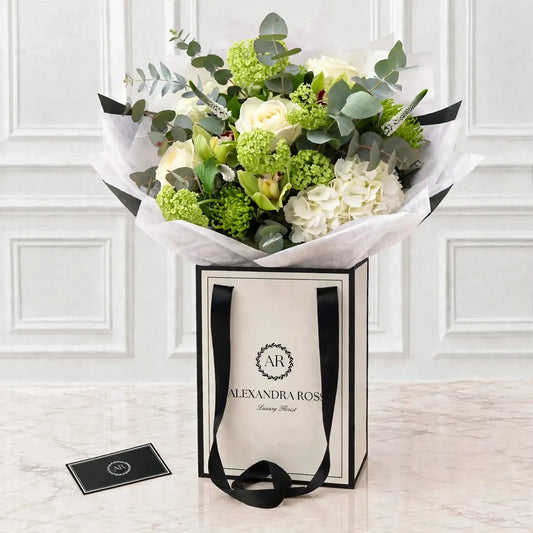 Freya white and lime bouquet — hydrangea, veronica, Avalanche roses, guelder rose, lime shamrock.