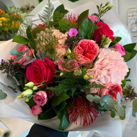 Harriet luxury bouquet — pink cushion protea, garden roses, lisianthus, phlox and hydrangea