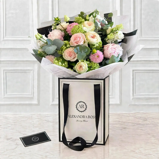 Helena blush pink garden-style bouquet — gardenia peonies, Wizard of Oz dahlias, Doris Day roses and lisianthus