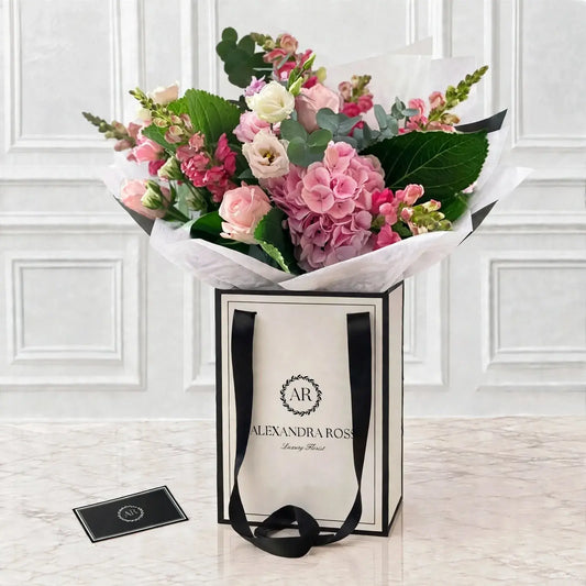 Romance pastel pink vase arrangement — Sweet Avalanche roses, hydrangea, snapdragons and spray roses