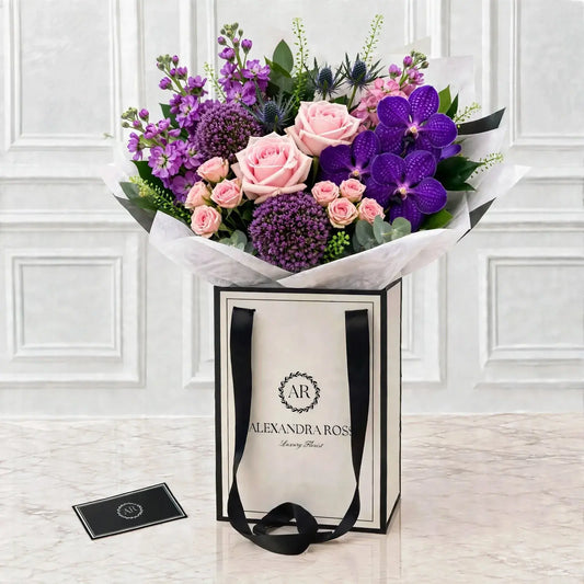 Skye pink, lilac and purple bouquet — Sweet Dolomiti roses, Vanda orchids, purple trachelium and eryngium