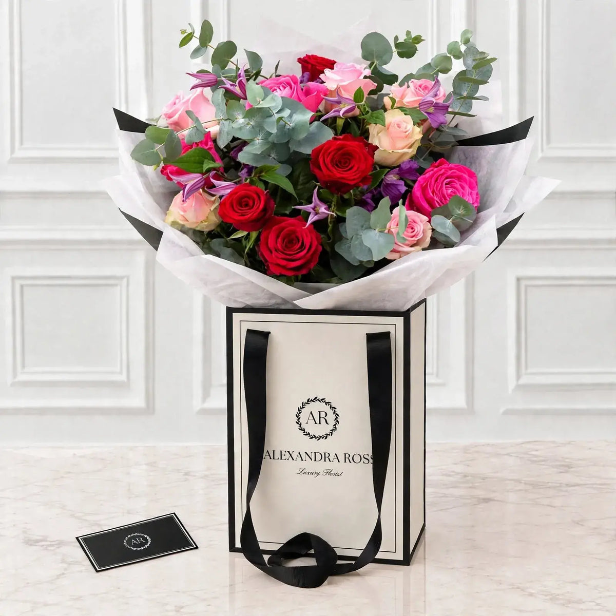 Sofia romantic bouquet — trio of premium roses with seasonal foliage